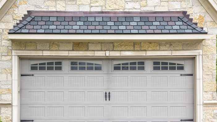 new garage door installation on brick home